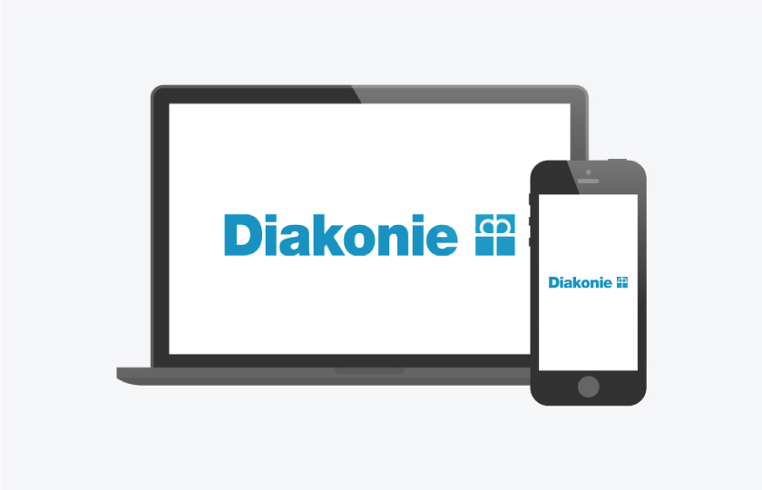 Das Diakonie-Logo auf einem Laptop und einem Smartphone.